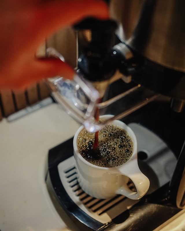 Image of coffee being poured into a cup